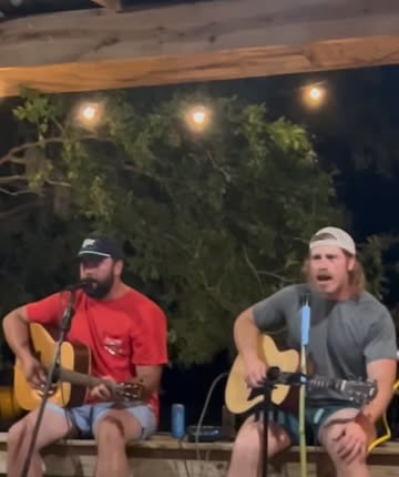 Will and Reid Shackelford acoustic set outdoors under string lights, July 2025